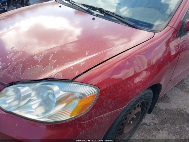 2004 TOYOTA COROLLA 1NXBR32E34Z209316 Photo 5