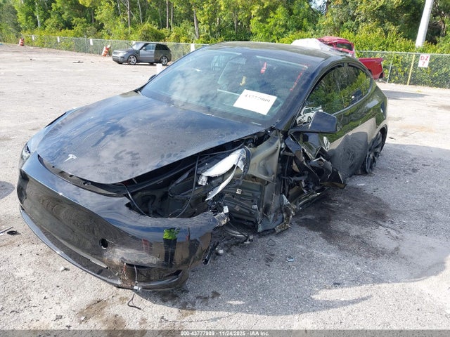 2023 TESLA MODEL Y 7SAYGDEE5PF881514 Photo 1