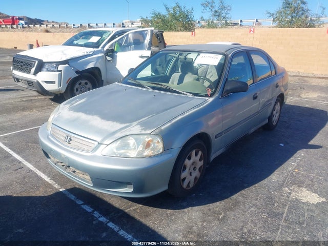 1999 HONDA CIVIC 1HGEJ6679XL010028 Photo 1