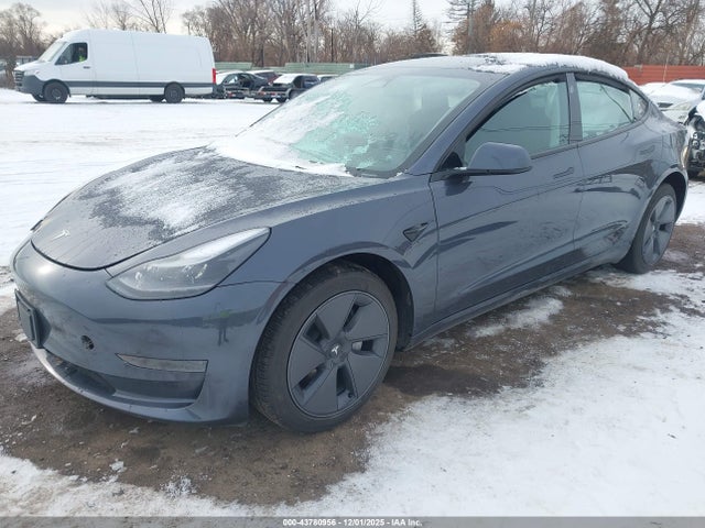 2023 TESLA MODEL 3 5YJ3E1EA2PF695695 Photo 1