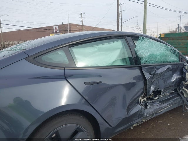 2023 TESLA MODEL 3 5YJ3E1EA2PF695695 Photo 7