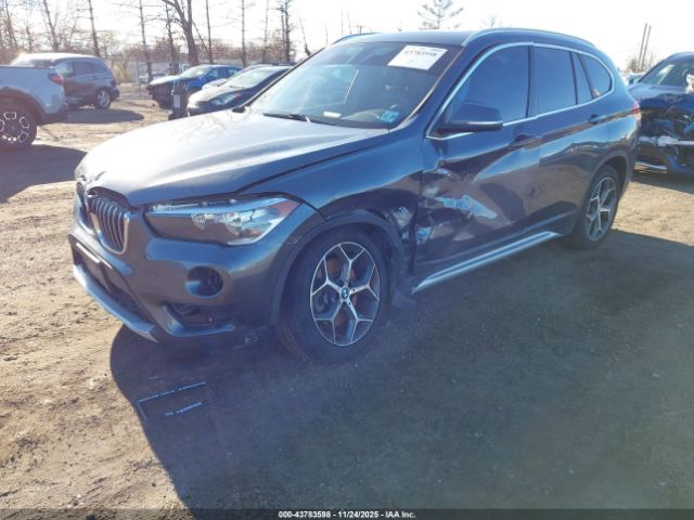 2018 BMW X1 WBXHT3C35J5K27998 Photo 1
