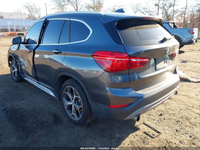 2018 BMW X1 WBXHT3C35J5K27998 Photo 2