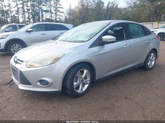 2014 FORD FOCUS 1FADP3F21EL218063 Photo 1