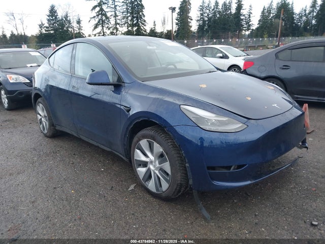 2023 TESLA MODEL Y 7SAYGDEE2PF922441 Photo 0