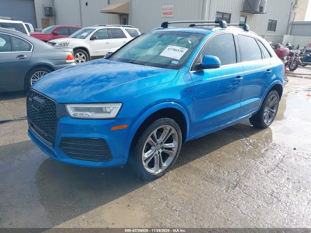 2016 AUDI Q3 WA1GFCFS6GR005081 Photo 1