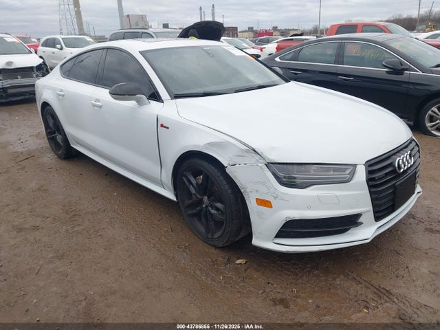 2016 AUDI A7 WAUWGAFC6GN038100