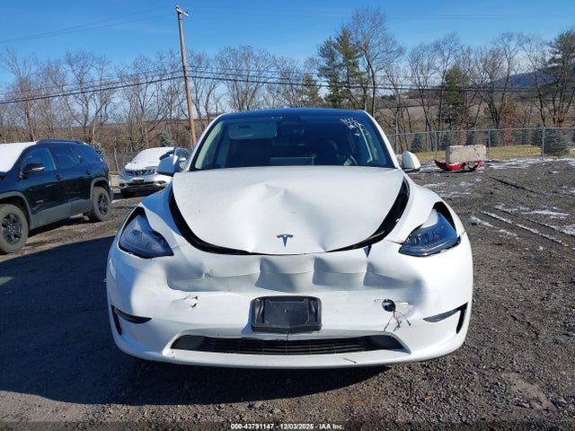 2024 TESLA MODEL Y 7SAYGDEE3RF185141 Photo 5