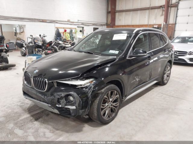 2017 BMW X1 WBXHT3C38H5F79602 Photo 1