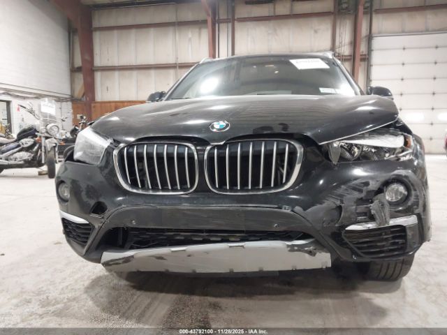 2017 BMW X1 WBXHT3C38H5F79602 Photo 5