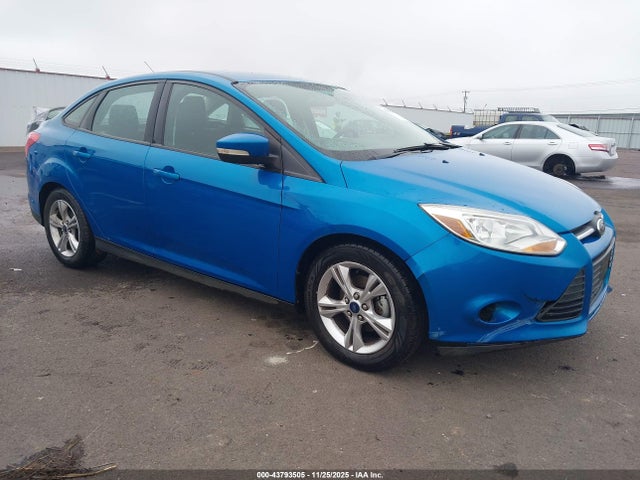 Ford FOCUS SE 2014 1FADP3F21EL306241 главное изображение