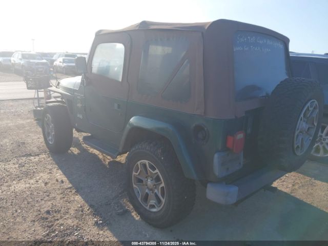 1999 JEEP WRANGLER 1J4FY49S2XP447164 Photo 2