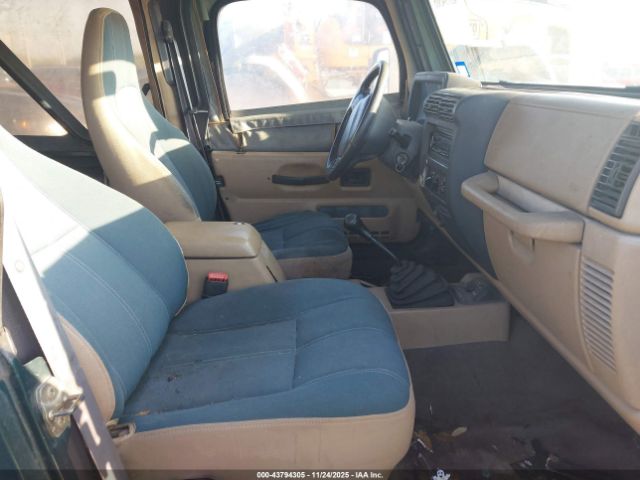 1999 JEEP WRANGLER 1J4FY49S2XP447164 Photo 4