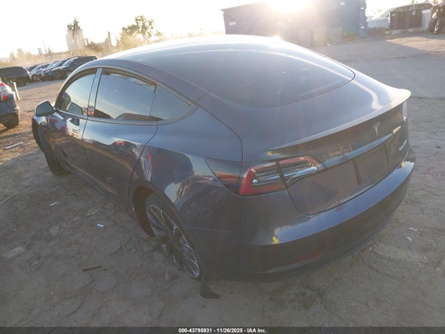 2023 TESLA MODEL 3 5YJ3E1ECXPF690830 Photo 2