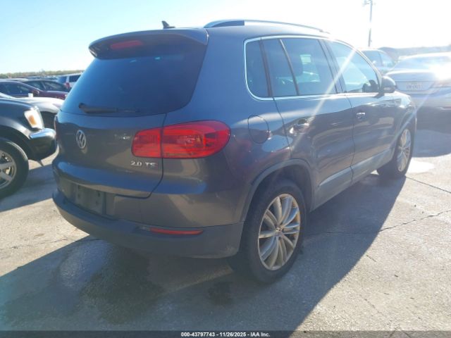2014 VOLKSWAGEN TIGUAN WVGAV3AX7EW583461 Photo 3