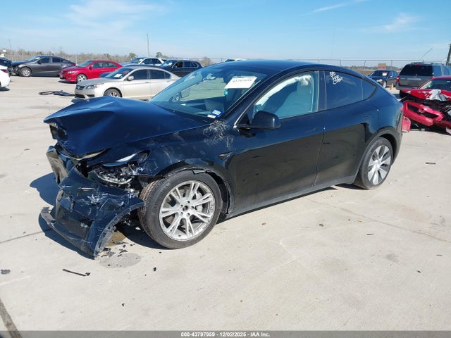 2023 TESLA MODEL Y 7SAYGDEE3PF638090 Photo 1