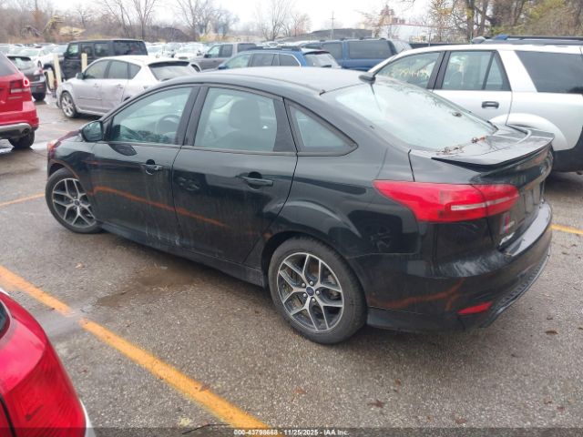 2015 FORD FOCUS 1FADP3F22FL385209 Photo 2