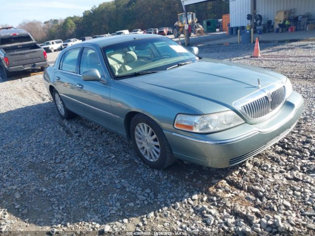 2004 LINCOLN TOWN CAR 1LNHM81W74Y657664