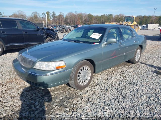 2004 LINCOLN TOWN CAR 1LNHM81W74Y657664 Photo 1