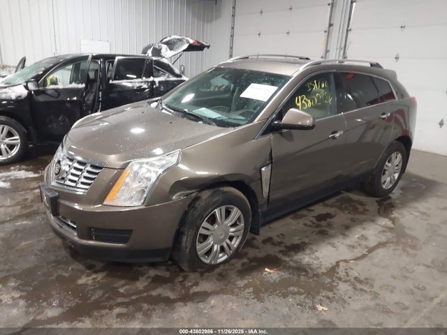 2014 CADILLAC SRX 3GYFNEE30ES654082 Photo 1