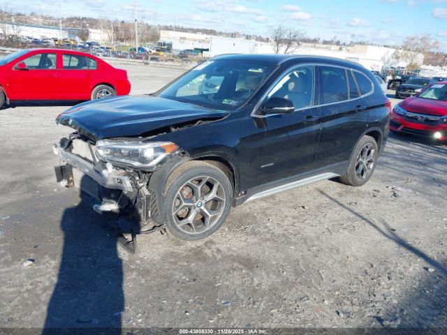 2016 BMW X1 WBXHT3C31G5E48347 Photo 1
