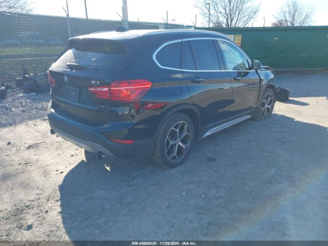 2016 BMW X1 WBXHT3C31G5E48347 Photo 3