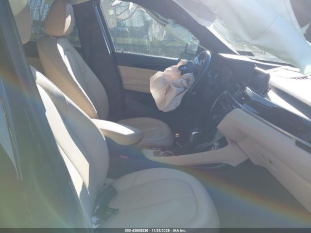 2016 BMW X1 WBXHT3C31G5E48347 Photo 4