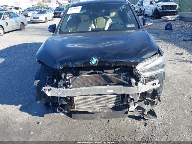 2016 BMW X1 WBXHT3C31G5E48347 Photo 5