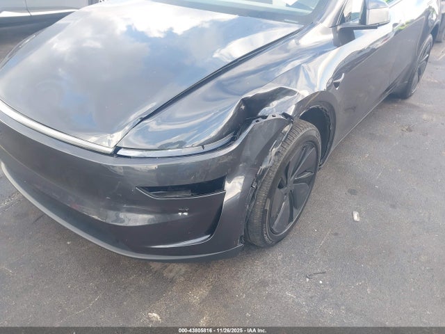 2026 TESLA MODEL Y 7SAYGDEDXTA440704 Photo 5