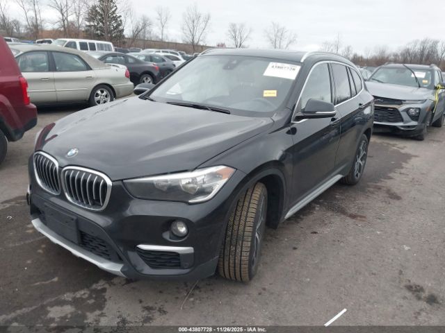 2019 BMW X1 WBXHT3C59K5L35558 Photo 1