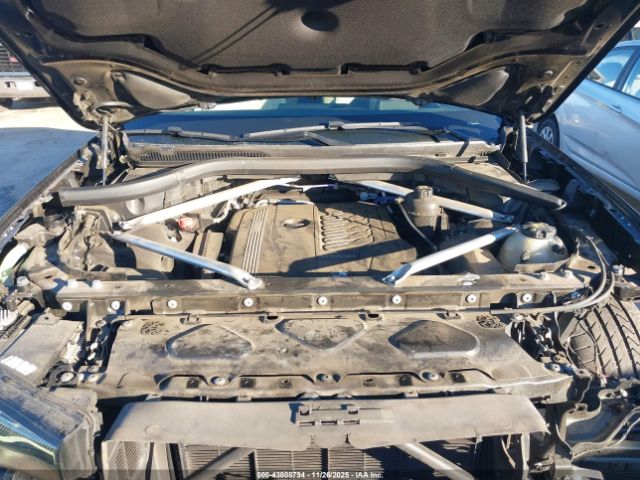 2021 BMW X7 5UXCW2C03M9F77496 Photo 9