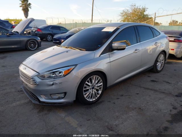 2015 FORD FOCUS 1FADP3J23FL305973 Photo 1