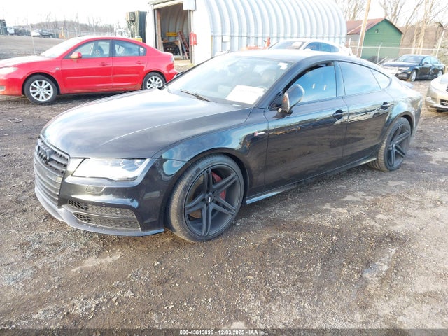 2014 AUDI A7 WAU2GAFC2EN148248 Photo 1