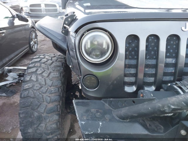 43814451 :رقم المزاد ، 1C4BJWDG1EL192714 vin ، 2014 Jeep Wrangler Unlimited Sport مزاد بيع