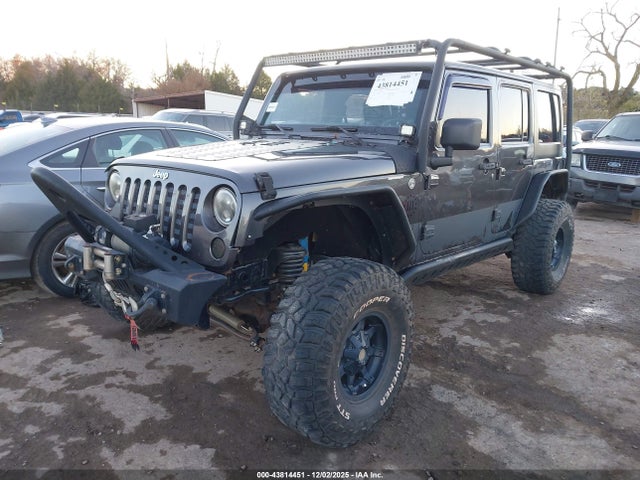 43814451 :رقم المزاد ، 1C4BJWDG1EL192714 vin ، 2014 Jeep Wrangler Unlimited Sport مزاد بيع