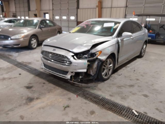 2015 FORD FUSION HYBRID 3FA6P0LU8FR242294 Photo 1