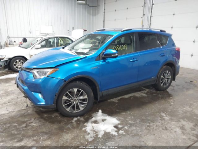2018 TOYOTA RAV4 HYBRID JTMRJREV7JD234658 Photo 1