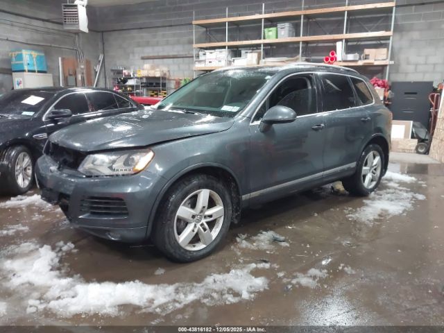 2012 VOLKSWAGEN TOUAREG WVGEK9BP2CD009757 Photo 1