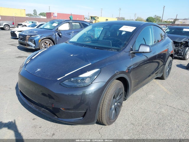 2024 TESLA MODEL Y 7SAYGDED8RF115772 Photo 1