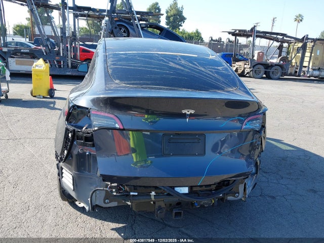 2024 TESLA MODEL Y 7SAYGDED8RF115772 Photo 5