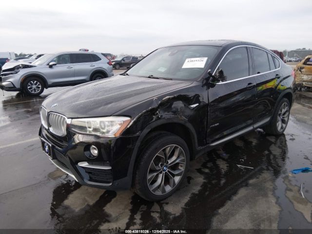 2018 BMW X4 5UXXW3C5XJ0T82477 Photo 1