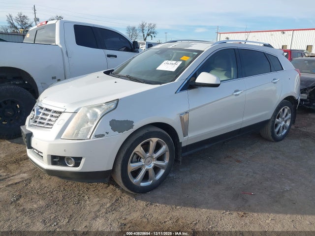 2013 CADILLAC SRX 3GYFNEE33DS548725 Photo 1