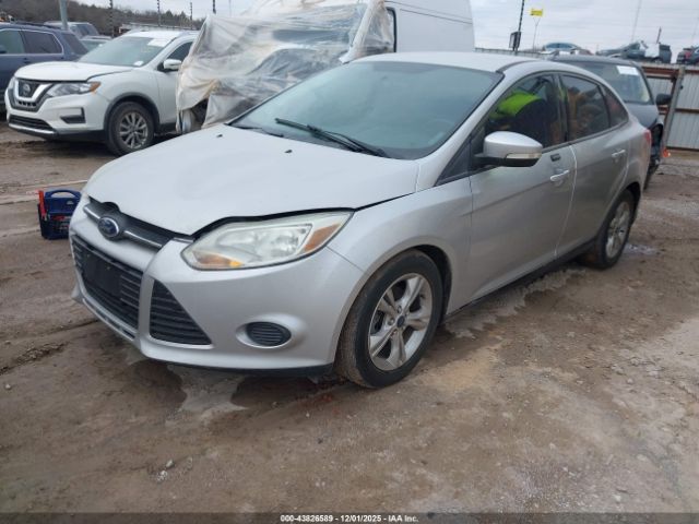 2014 FORD FOCUS 1FADP3F28EL372866 Photo 1