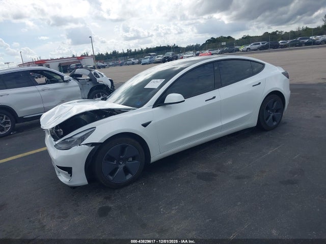 2023 TESLA MODEL 3 5YJ3E1EAXPF472448 Photo 1