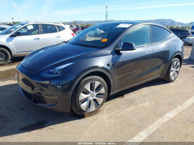 2024 TESLA MODEL Y 7SAYGDEE8RA226005 Photo 1