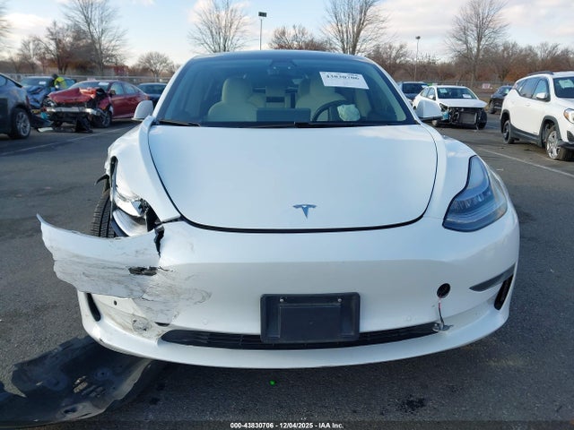 5YJ3E1EA6MF853760 Tesla Model 3 Standard Range Plus Rear-wheel Drive