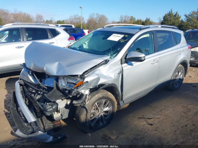 2016 TOYOTA RAV4 HYBRID JTMRJREV2GD031248 Photo 1