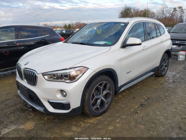 2017 BMW X1 WBXHT3C31H5F83846 Photo 1