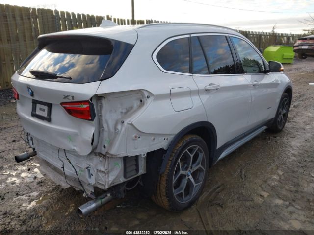 2017 BMW X1 WBXHT3C31H5F83846 Photo 3