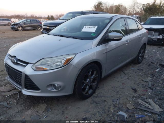 2013 FORD FOCUS 1FADP3F24DL227631 Photo 1
